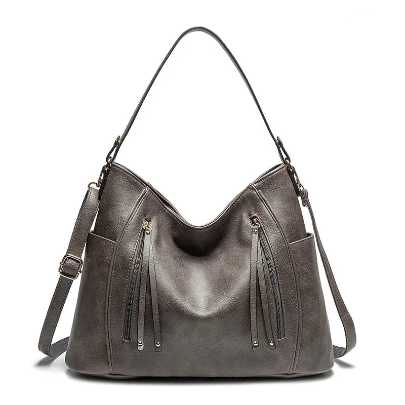 Wendy | Bolso de piel con flecos