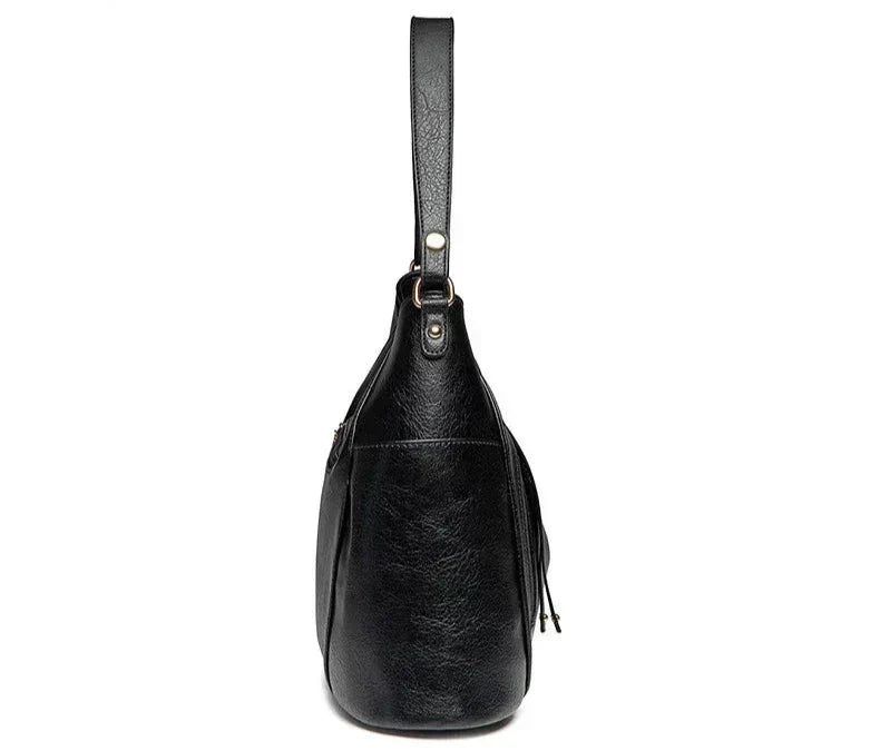 Wendy | Bolso de piel con flecos